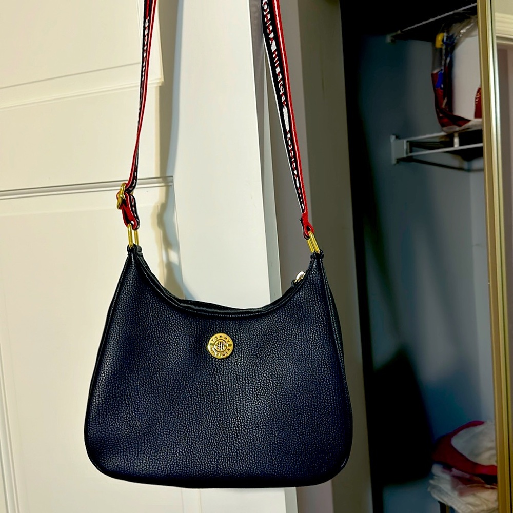 Blue Tommy Hilfigure hobo bag. Red white and blue strap